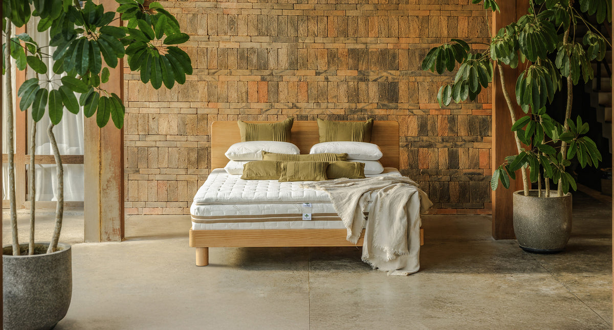 Heveya® natural organic latex mattress on a wooden bed frame
